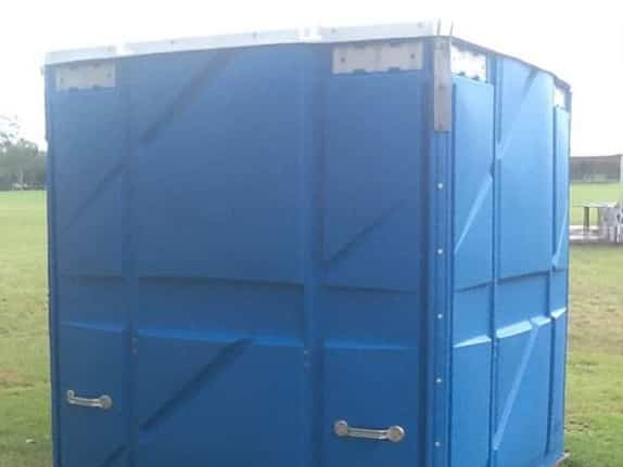 A large blue portable shower hired at a sports field in Rockhampton
